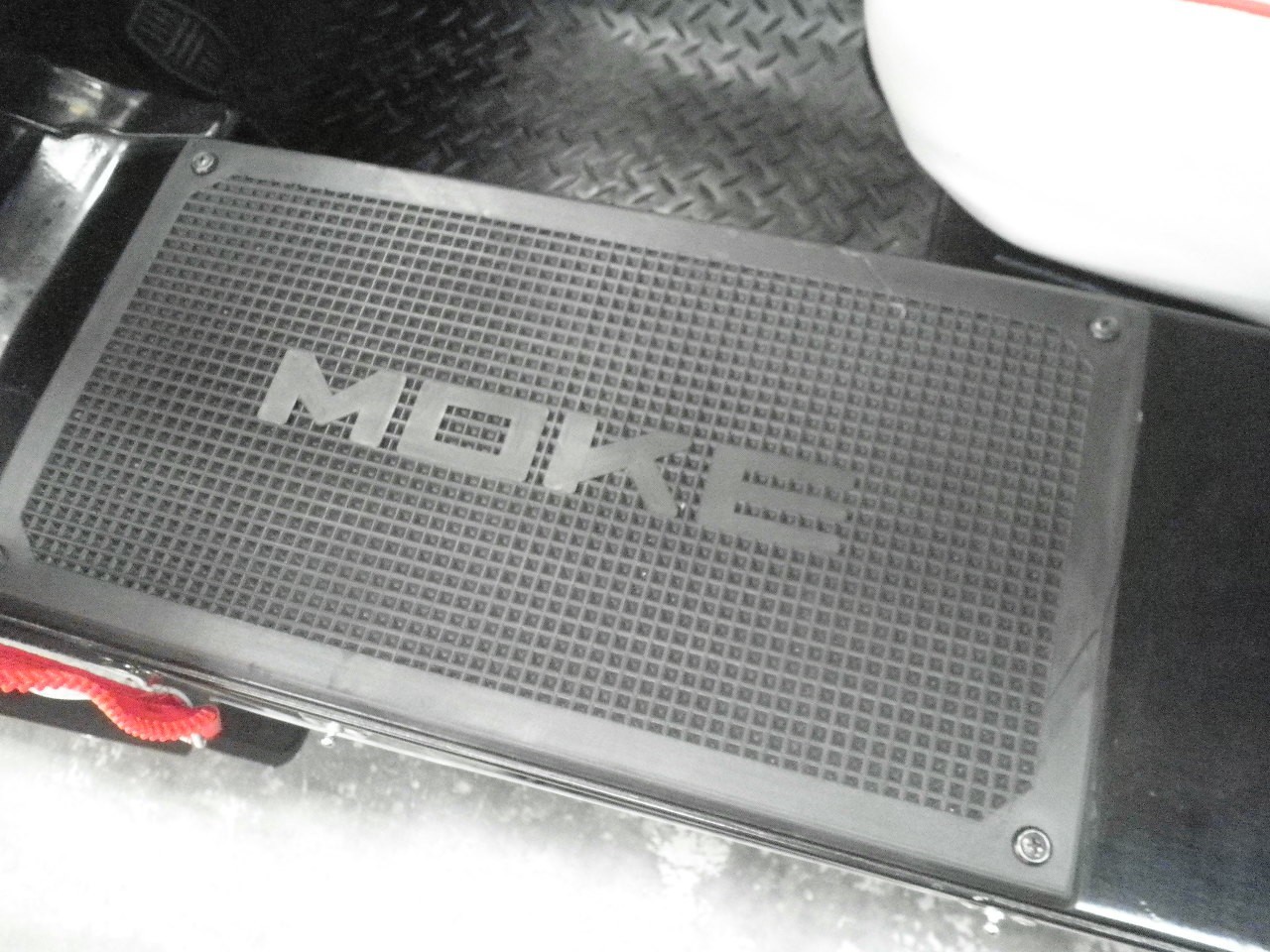 Tapis de caisson siglé MOKE